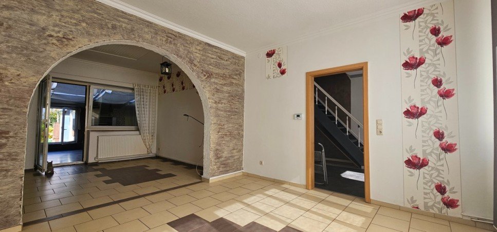 Esszimmer, Wohnzimmer mit Blick auf den Wintergarten Doppelhaush�lfte L�beck